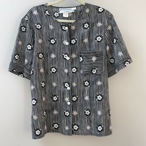 Black, white and gray shirt sleeved blouse. Size 12. Nearly new.